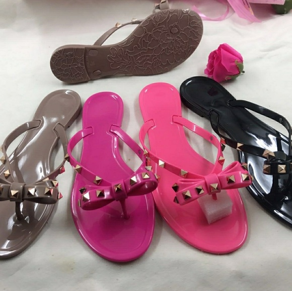 studded flip flops with bow